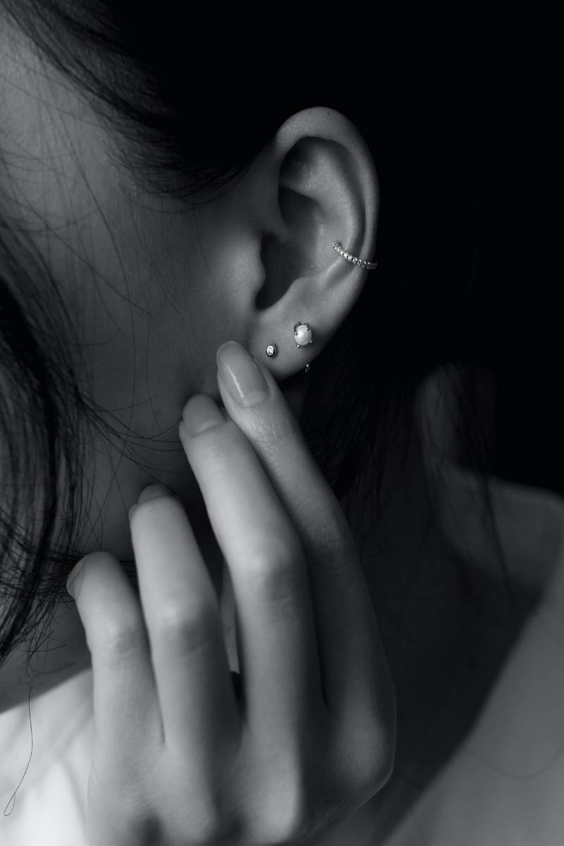Black and white image of ear jewellery